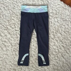 Lululemon size 4 navy blue capri leggings with back zipper pocket
